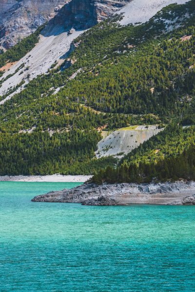 A stunning shot of mountainous landscape by the lake